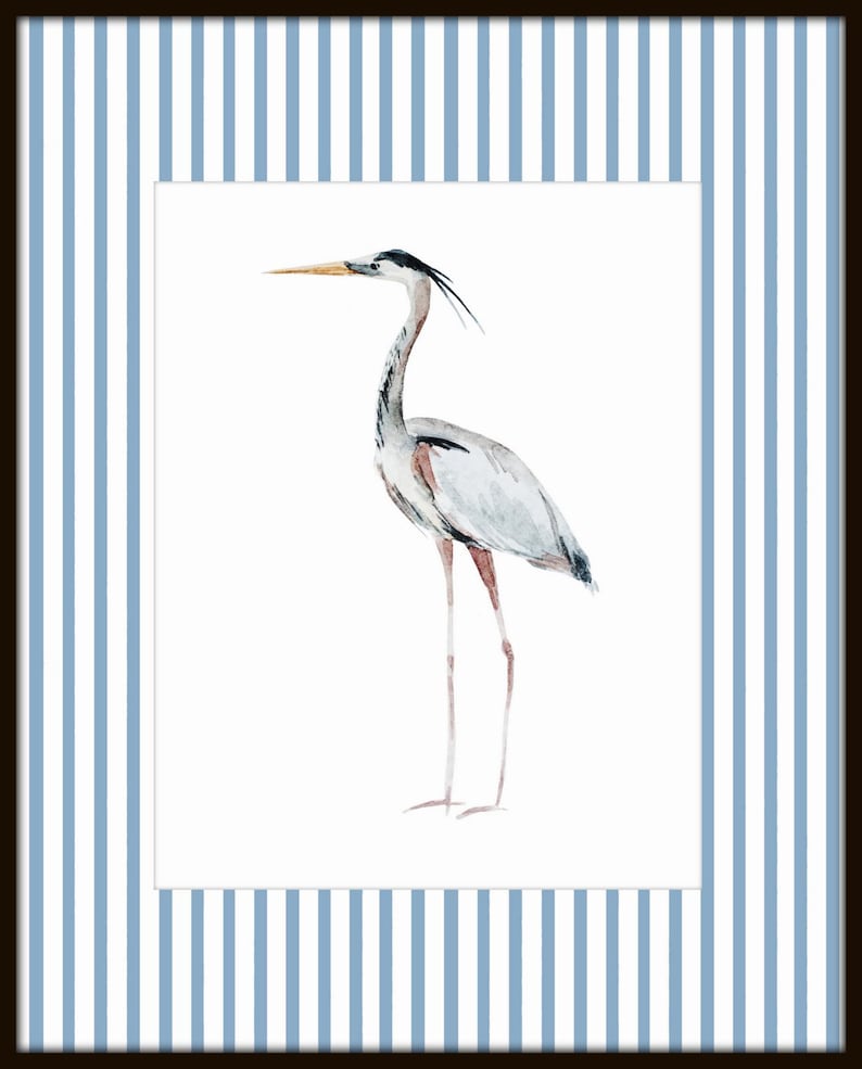 May include: A watercolor painting of a gray heron with a long, thin beak and long legs standing on a white background. The heron is framed by blue and white stripes.