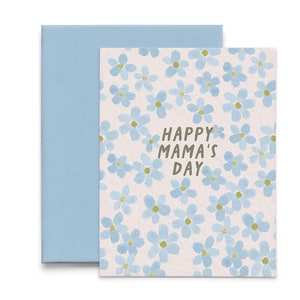 May include: A greeting card with a light blue floral pattern and the text "Happy Mama's Day" in brown lettering.