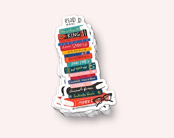 May include: A stack of colourful books with titles such as "King", "Jane Eyre", "Moby Dick", and "Animal Farm". The books are stacked on top of each other and have a pair of glasses on top. The text "Read More" is at the top of the stack.