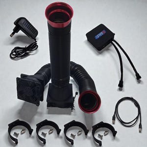 May include: An assortment of black and red computer components, including flexible tubes, fans, and a power adapter. The tubes have red rims, and the fans are square. Also included are mounting brackets and a small black box with the text "XPR3".