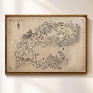 May include: A framed wall art print featuring a detailed, sepia-toned fantasy map of the Lands Between from Elden Ring. The illustration displays intricate mountain ranges, forests, a large central tree, and coastal areas, with the text Elden Ring.