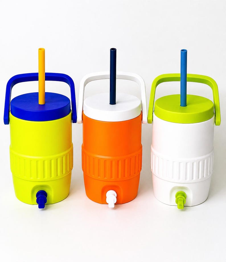 May include: Three colorful water coolers with spouts and handles. The coolers are yellow, orange, and white, each with a different colored lid and straw. The yellow cooler has a blue lid and handle, the orange has a white lid and handle, and the white cooler has a green lid and handle.