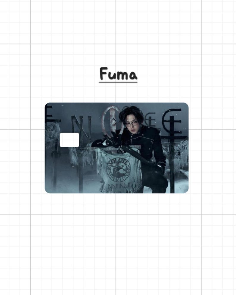 May include: A credit card featuring an image of a person in a black uniform, with the name "Fuma" above. The card has a white rectangle for a chip and a design of a banner with a crest.