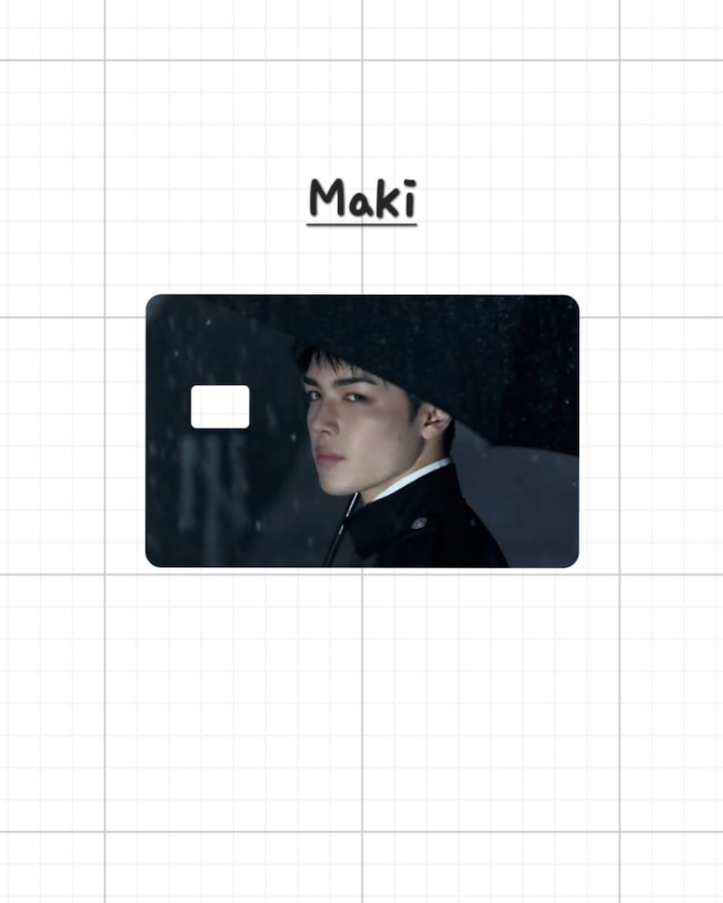 May include: A rectangular card with a portrait of a person holding an umbrella in the rain. The card has a white rectangle on the left side. The word "Maki" is written above the card in black.