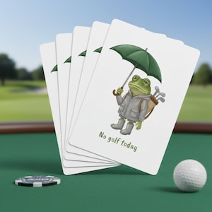 May include: A set of three ceramic mugs with a speckled, matte finish. The mugs are in shades of cream, light gray, and dark gray. Each mug has a simple, minimalist design and a rounded handle.