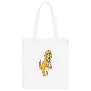 May include: White tote bag with a cartoon illustration of a golden retriever dog. The dog is standing on its hind legs, wearing a bone-shaped tag. The bag has two white handles.