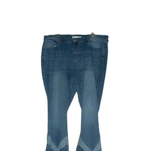 May include: Blue denim jeans with a wide leg and a chevron pattern at the bottom of the legs.