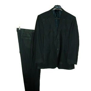 May include: A dark grey pinstripe suit, comprising a two-button jacket and matching trousers. The jacket hangs on a black hanger, and the trousers are clipped to a separate hanger. The suit is set against a white backdrop.