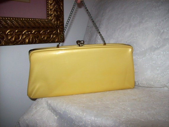 yellow patent clutch bag
