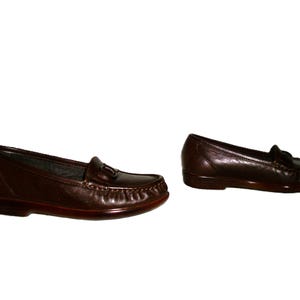 Vintage Ladies Brown Leather Loafers Slip Ons by SAS Size 5 Narrow Inside Toe/Heel equals 8 7/8 inches Leather upper, Rubber Soles Width at Ball is 3 inches Good- Vintage Condition Only 8 Dollars #shoes #womensshoes #size5shoes #leathershoes #brownshoes #Brownflats #size5narrow #size5flats #size5loafers #leatherloafers #madeinusa #madeinusashoes #brownslipons #leatherslipons #vintageshoes #vintageloafers #vintageflats #size5brownshoes #madeinusaloafers #loaferssize5 #SASshoes #SASloafers #SAS