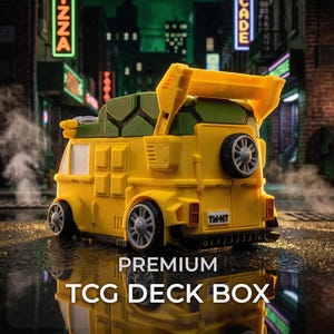 May include: A yellow and green TCG deck box shaped like a van with a turtle shell roof, a rear spoiler, and a spare tire mounted on the back. The license plate reads TM-NT. The box features detailed wheels and a textured shell pattern on top.