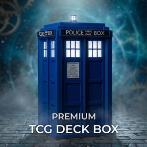 May include: A blue police box TCG deck box featuring white windows, a light on top, and black signage reading POLICE PUBLIC CALL BOX. The front door includes a white sign with text, and the words PREMIUM TCG DECK BOX are printed below.