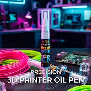 May include: A clear plastic precision oil pen with a black label featuring the text VOXEL WORKSHOP PRECISION OIL PEN and a treasure chest graphic. The pen has a white applicator tip and a clear cap, positioned vertically among neon pink filament.