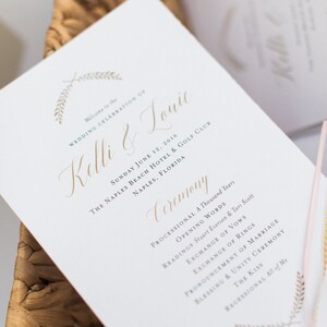 May include: Wedding ceremony program with gold lettering on white paper. The program lists the order of events for the wedding ceremony of Kelli and Louie, taking place on Sunday, June 12, 2016 at The Naples Beach Hotel & Golf Club in Naples, Florida.