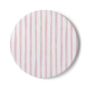Puede incluir: Un posavasos redondo con rayas rosas verticales sobre fondo blanco. El posavasos está hecho de un material sólido y tiene una superficie lisa. El diseño es simple y moderno, adecuado para varios estilos de decoración del hogar.