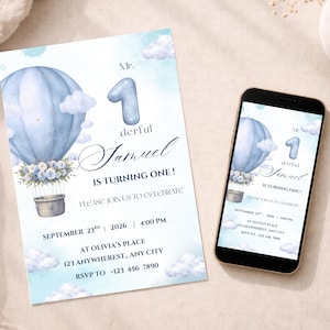 May include: A light blue watercolor-style invitation for a first birthday. The design features a hot air balloon, clouds, and the text "Mr. Wonderful Samuel is turning one!" displayed on a white background. A smartphone displays the same invitation.