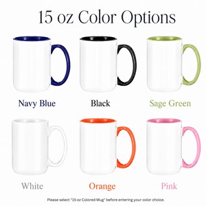 May include: A collection of six 15 oz ceramic mugs displayed in two rows. The mugs feature white bodies with colored interiors and handles in navy blue, black, sage green, white, orange, and pink. The text 15 oz Color Options is at the top.