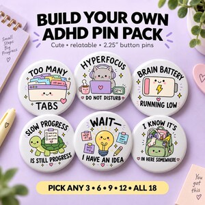 May include: A set of six round 2.25-inch button pins featuring ADHD-themed illustrations and text. Designs include a computer window with tabs, a cat with headphones, a low battery icon, a turtle, a lightbulb, and a cluttered backpack.