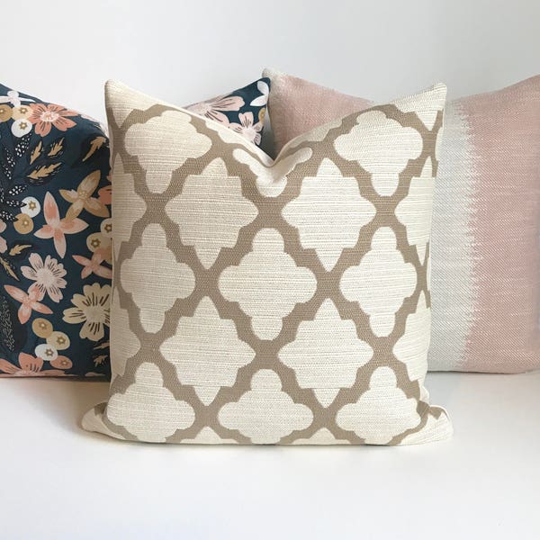 Tan and ivory morrocan quatrefoil geometric decorative throw pillow