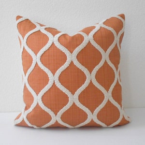 Orange and cream tufted trellis decorative pillow cover