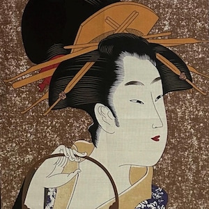 May include: A Japanese woodblock print depicting a woman in traditional dress. She has black hair styled with decorative hairpins and a fan. The woman holds a circular object, against a textured brown background.