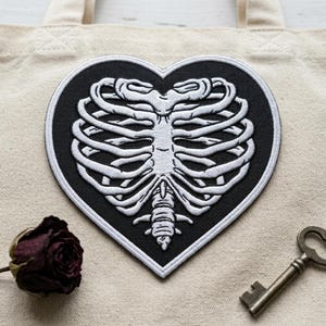 Skeleton Ribcage Heart Patch | Embroidered Gothic Heart Iron On Patch | Anatomical Rib Cage Badge | Cute Goth Punk Jacket Decal