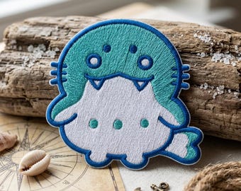 Cute Sea Monster Embroidered Patch | Kawaii Ocean Creature Iron On Patch | Anime Style Backpack Badge | Nautical Jacket Applique