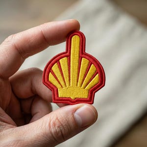 May include: A white ceramic mug with a colorful floral design. The mug features a handle and is likely used for hot beverages. The floral pattern includes various flowers and leaves.