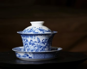Juego de té Gaiwan "100 Boys" de porcelana azul y blanca pintada a mano