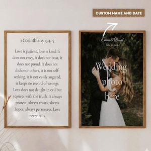 May include: Two framed prints. One features the text of 1 Corinthians 13:4-7 in a wooden frame. The other frame contains a wedding photo with the text "Wedding photo here" and the names "Emma & Daniel" and the date "June 12, 2026".