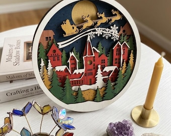 MD501 Christmas Village Shadow Box SVG, plik wycinany laserowo z warstwami 3D Santa Over the Moon, okrągła świąteczna dekoracja ścienna, Glowforge CNC