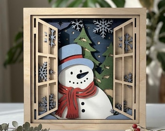 MD510 Snowman Shadow Box SVG, plik wycinany laserowo z warstwami 3D i bałwanem w oknie, świąteczna dekoracja ścienna z płatkami śniegu, plik CNC Glowforge