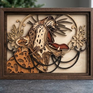 May include: A layered wooden art piece featuring a roaring leopard with a detailed spotted coat. The artwork is framed in a dark wood, with floral and chain accents. The leopard's open mouth reveals a red interior.