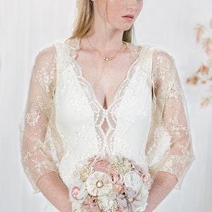 Beautiful bride wearing a lace bridal bolero.
Lace shawl, bridal shrug, wedding bolero, wedding party, bridesmaids shawl