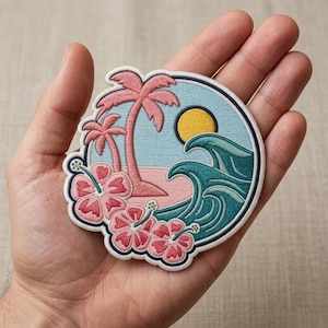 May include: A circular embroidered patch featuring a tropical beach scene with pink palm trees, a yellow sun, teal ocean waves, and three pink hibiscus flowers with white centers. The design is bordered by a dark blue stitched edge on a white background.