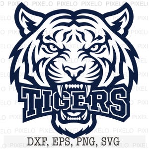 May include: A navy blue and white tiger head graphic with the word "TIGERS" in bold letters. The image includes the file formats DXF, EPS, PNG, and SVG.