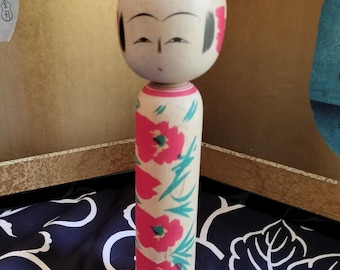 Vintage traditional collectible Japanese kokeshi wooden doll. Flower design. Handmade and hand crafted. 20cm tall 200grams. Kawaii face.