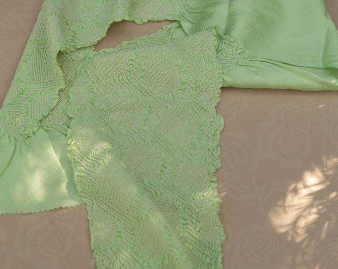 Vintage Japanese rinzu silk kimono obi-age pale spring green coloured silk 130cm long. Woven sayagata design. Shibori geometrics