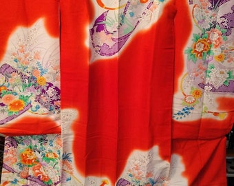 Vintage Japanese orange silk kids kimono w/ scroll and chrysanthemum flowers. Bold and vivid. Silk outer synthetic lining.