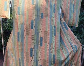 Vintage 1990's Japanese  handsewn kimono with shades of green with geometric patchwork pattern soft silk.