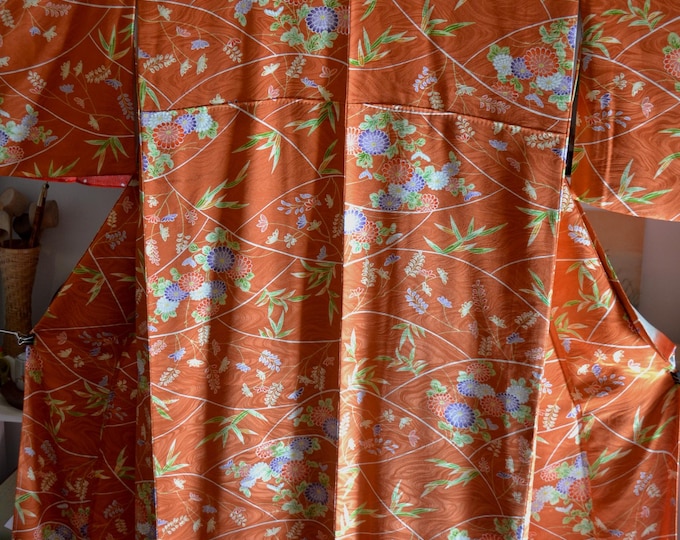 Vintage 1980's Japanese  handsewn kimono with  dyed pattern of Japanese flowers. Komon kimono.  Orange colour w/ amethyst lime carnelian red