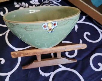 Vintage Japanese hand-made tea bowl. Brown stoneware, with Celadon glaze karamono style shaped chawan. Gold accents. Signed by Artist.