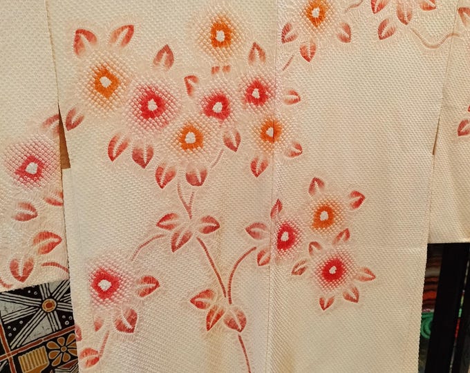 Vintage Japanese hand stitched silk  haori kimono jacket cream and pink shibori floral pattern. Pink and green lining.Beautiful.