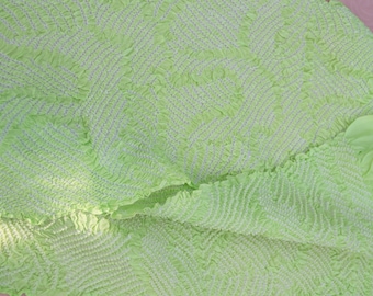 Vintage Japanese rinzu silk kimono obi-age bright spring green coloured silk 116cm long. Woven sayagata design. Shibori geometrics small