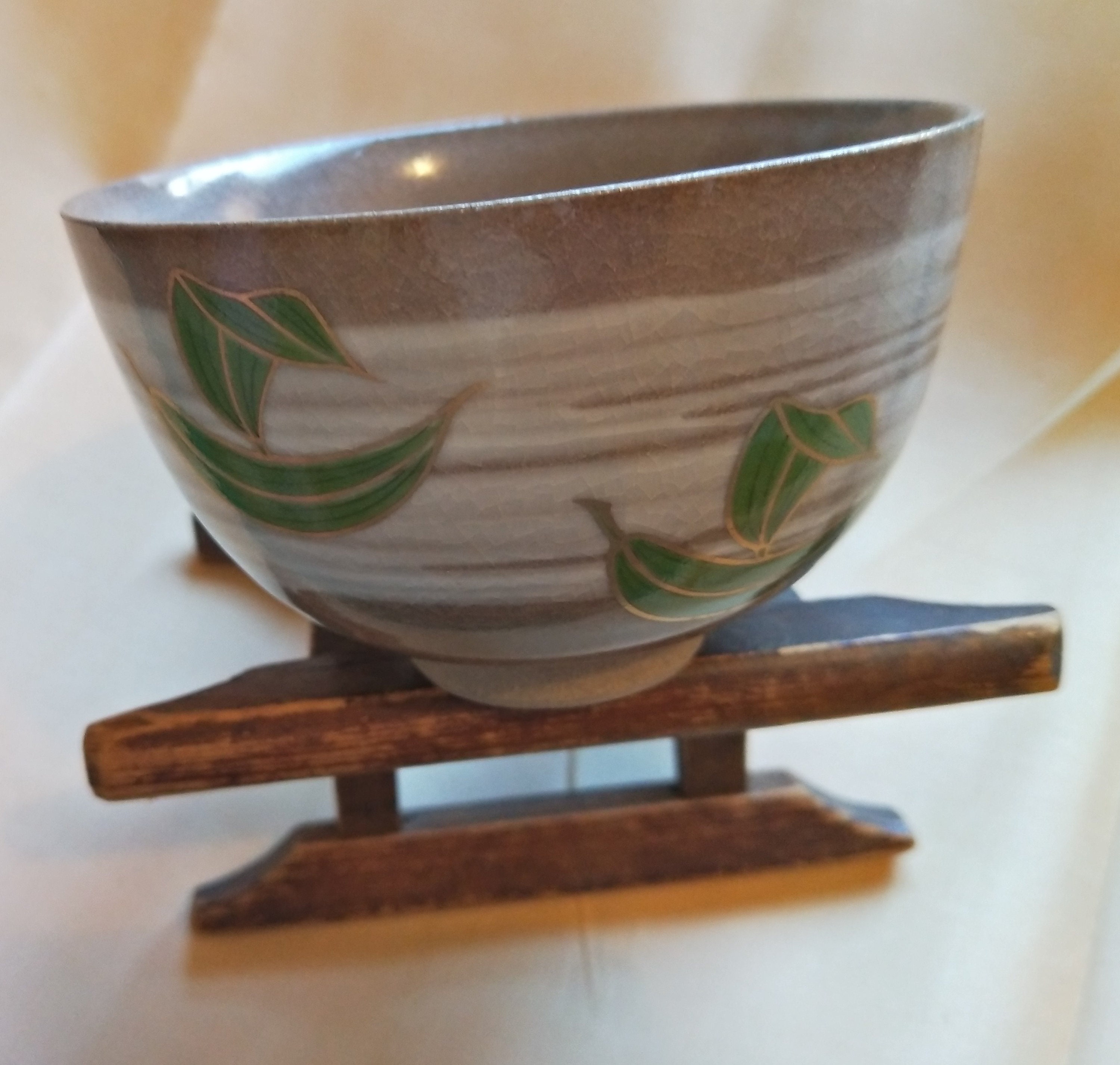 Vintage Japanese handmade tea bowl. Cream and clear glaze with brush