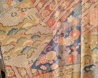 Vintage 1980's Japanese  handsewn silk kimono w/ sarassa traditional pattern. Soft silk with stencil overlay pattern. Ochre, steel blue, red