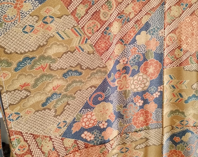 Vintage 1980's Japanese  handsewn silk kimono w/ sarassa traditional pattern. Soft silk with stencil overlay pattern. Ochre, steel blue, red