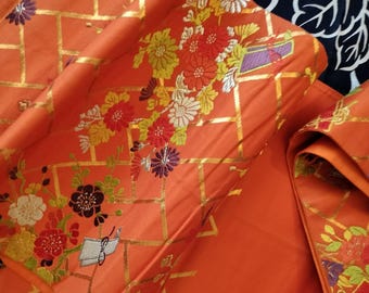 Vintage Japanese Fukuro obi orange silk woven . Floral design in bright vivid colours.