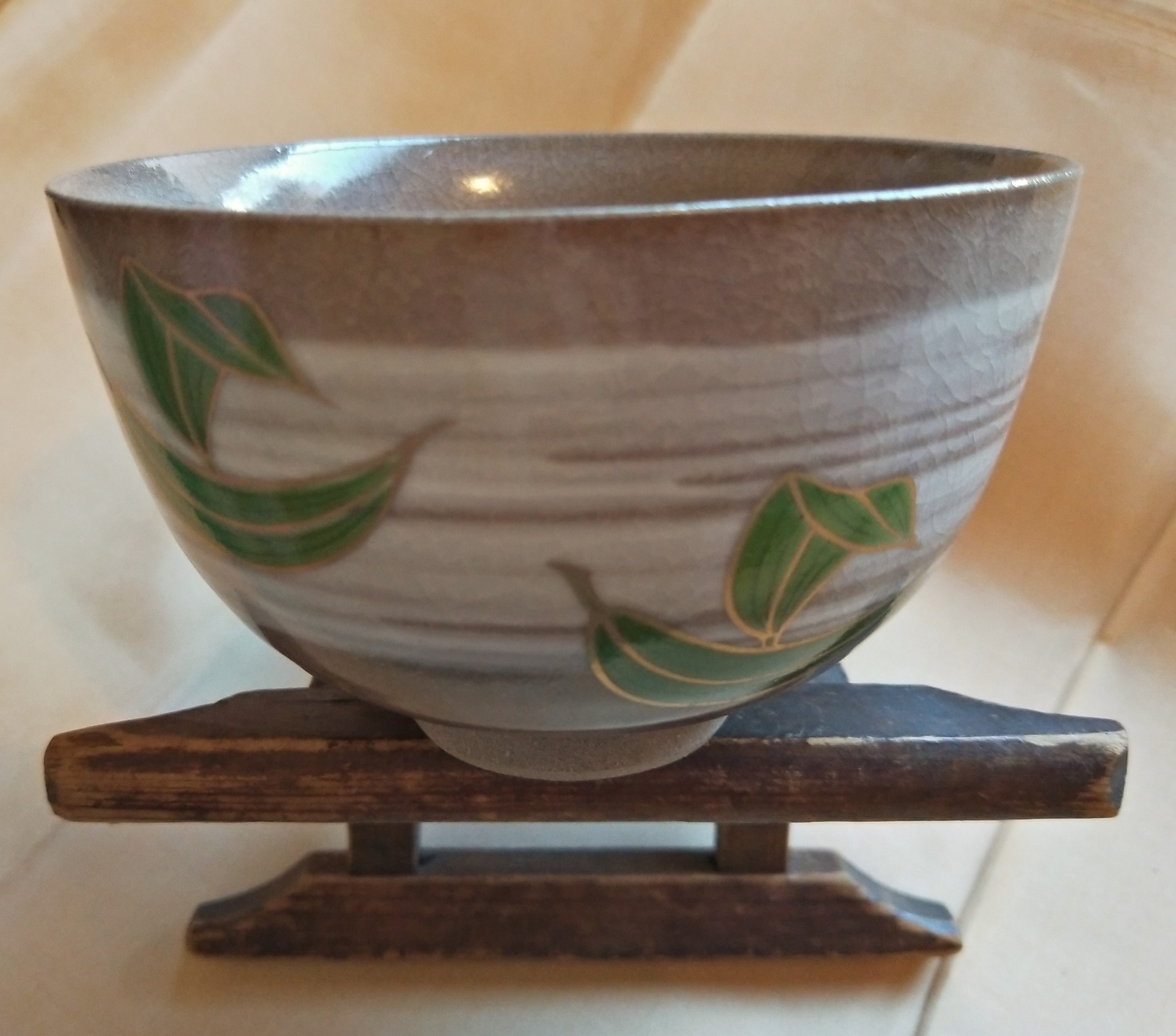 Vintage Japanese handmade tea bowl. Cream and clear glaze with brush