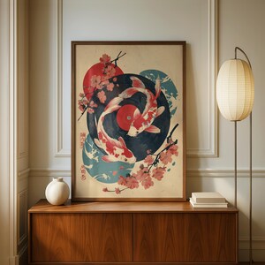 Pode incluir: Uma impress&atilde;o art&iacute;stica emoldurada com dois peixes koi nadando em torno de um disco de vinil. A obra de arte tem uma est&eacute;tica vintage com flores de cerejeira, um sol vermelho e texto japon&ecirc;s. A paleta de cores inclui vermelho, branco, azul e bege.